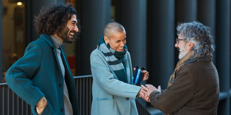 professional-business-people-talking-and-meeting-on-the-street.jpg